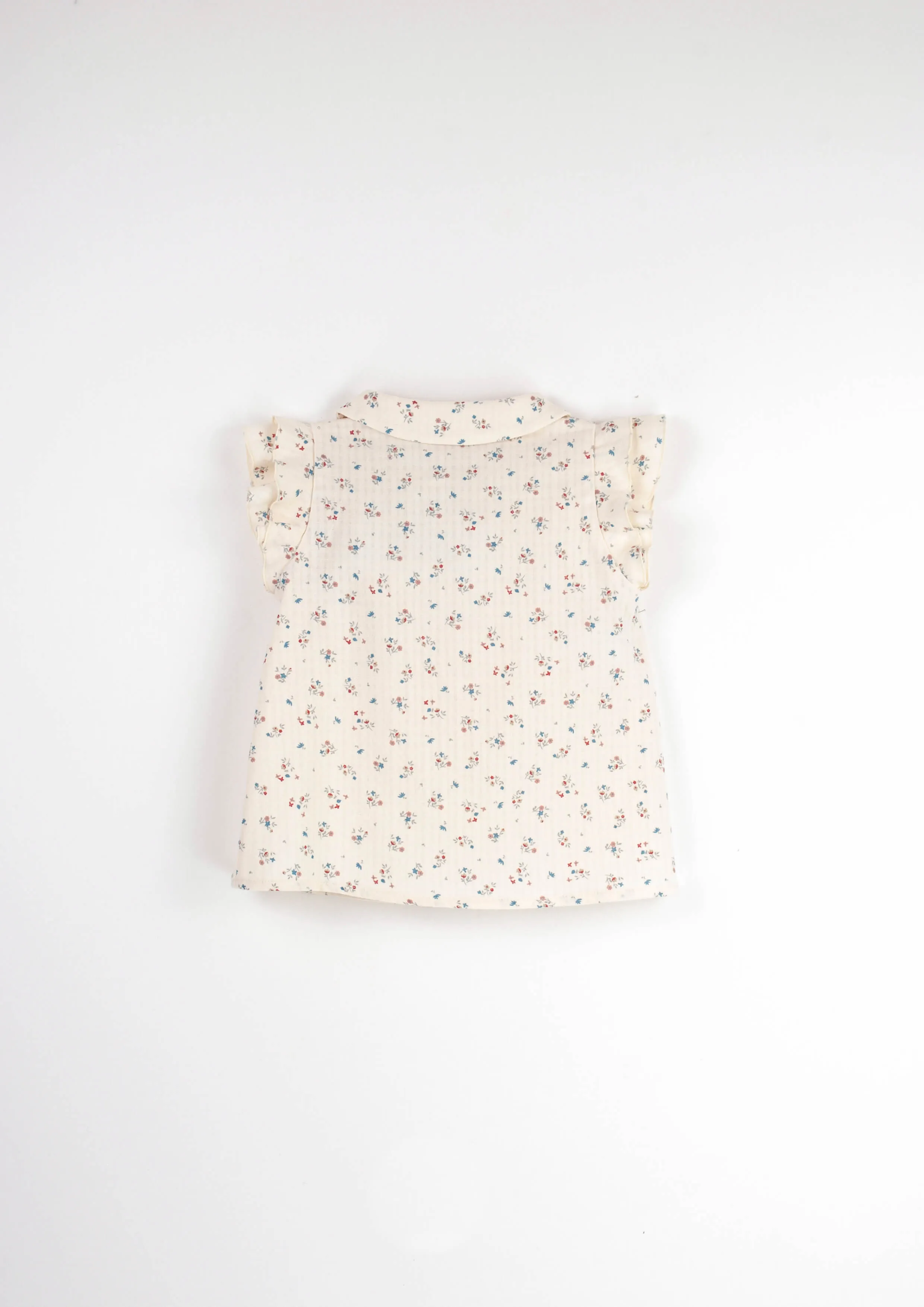 Mod.6.4 Floral sleeveless shirt with frills