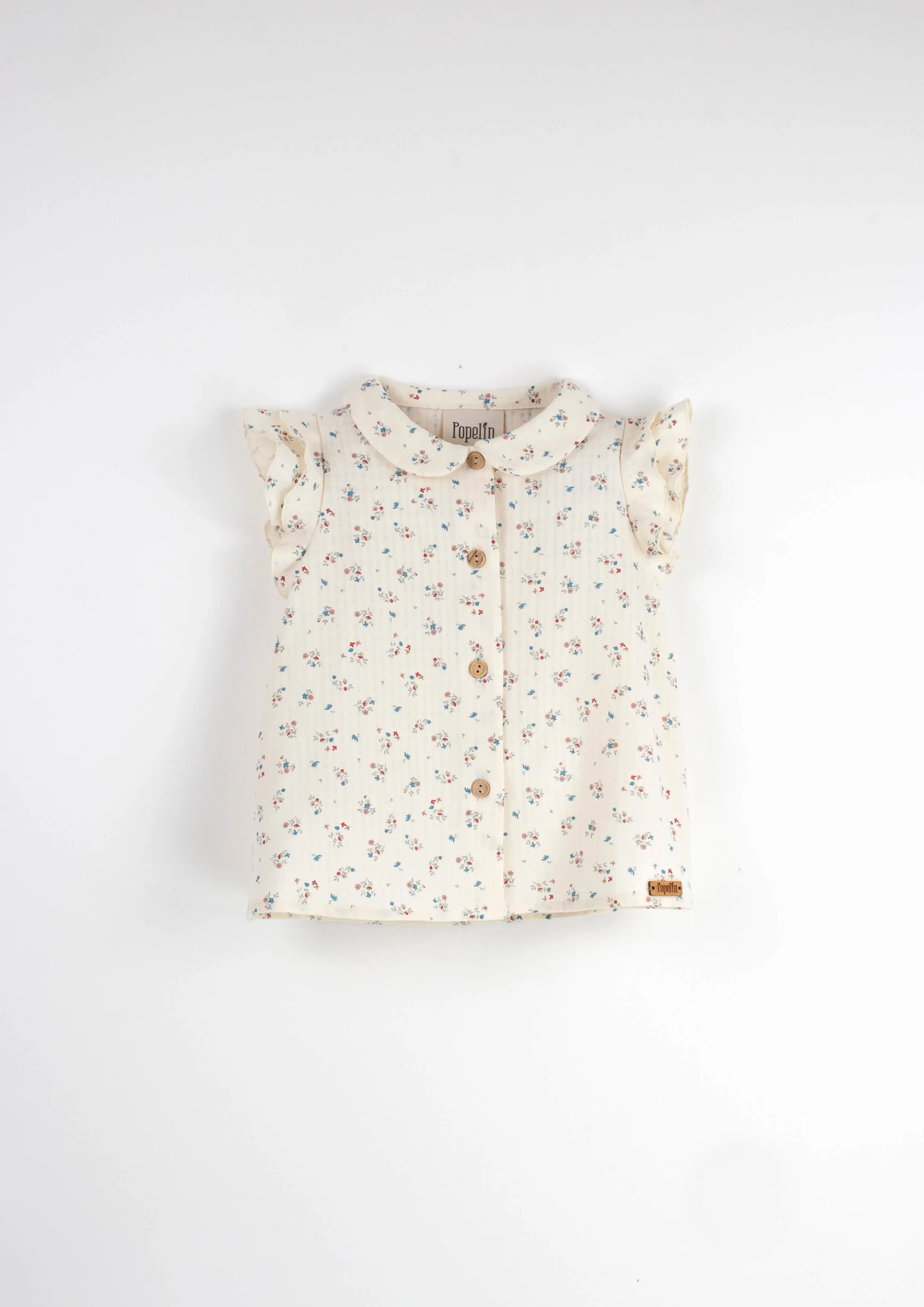 Mod.6.4 Floral sleeveless shirt with frills